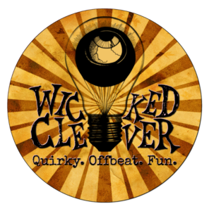 Logo: Wicked Clever eyeball in a lighbulb logo, on a brown and yellow starburst pattern, with the words "Quirky. Offbeat. Fun." in a typed font below.